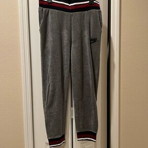 Nike track pants, size M